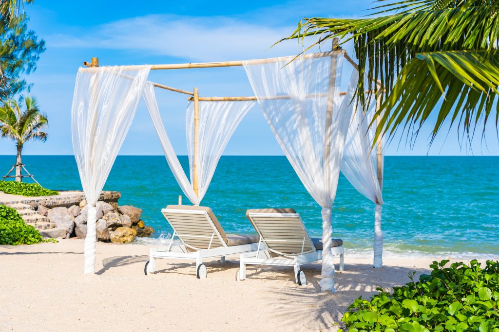 beautiful-umbrella-chair-around-beach-sea-ocean-with-blue-sky-travel (1)